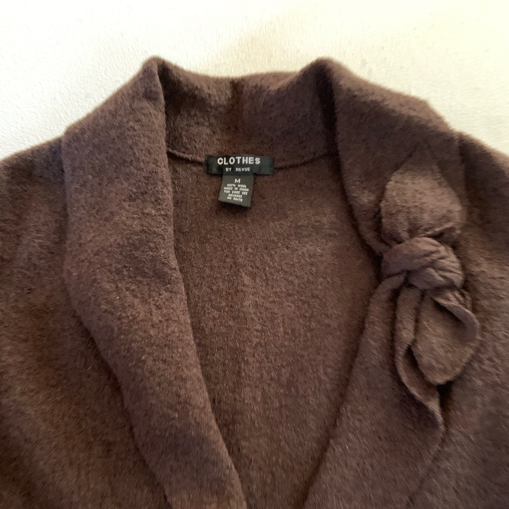 100% brown wool sweater.